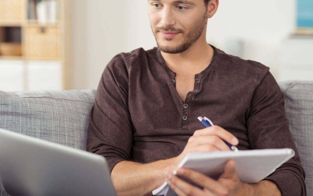 Man Writing Some Notes